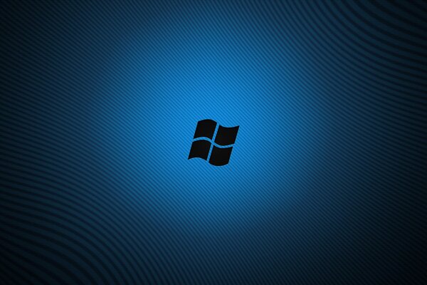 Das Windows-Logo leuchtet auf blauem Hintergrund