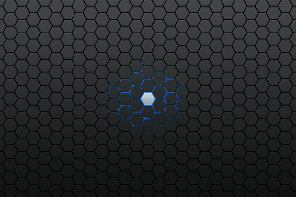 Leuchtender Hexagonpunkt auf grauem Wabenhintergrund