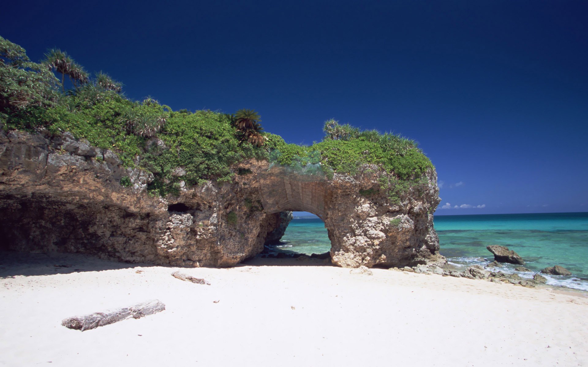 japan okinawa strand meer ozean sand bogen felsen steine grün