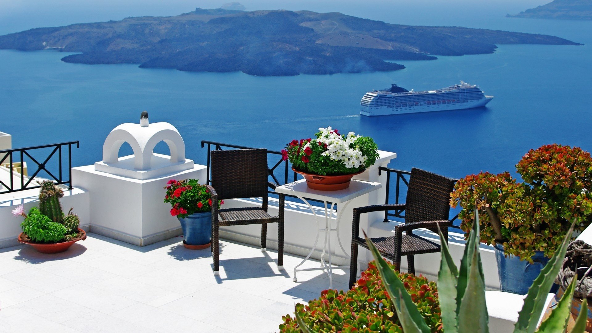 griechenland santorini ägäis oia abend stadt lichter kirche kuppel häuser