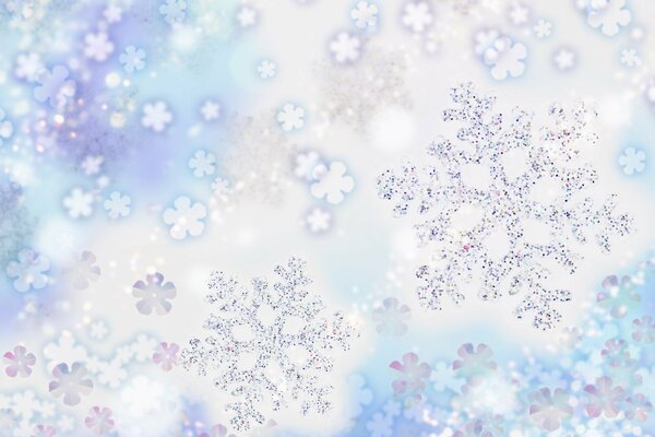 Glänzende Schneeflocken auf einem blauen und weißen Hintergrund
